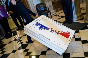 Graphs being wheelered into the Senate chamber before an all-night session by the “climate caucus.”